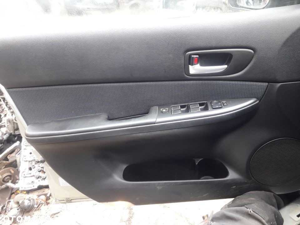 Mazda 6 05-07 Lift Tapicerka drzwi Lewy przód - 1