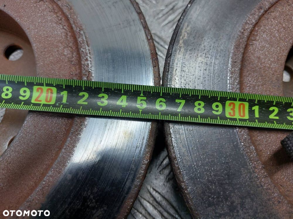 TARCZE HAMULCOWE TYŁ + KLOCKI + ZACISKI MAZDA 323F BJ 2.0 TD - 4