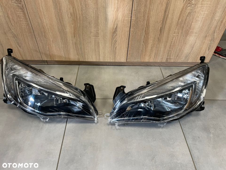 Opel Astra J reflektor przód depo nowy lift - 1