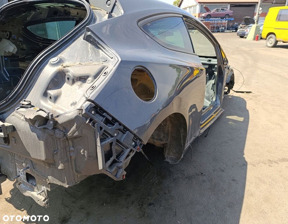 BŁOTNIK PRAWY TYŁ TYLNY 3D OPEL ASTRA J GTC Z190 2015r. - 2