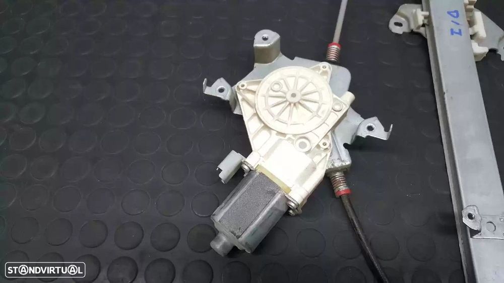 ELEVADOR DE VIDRO FRONTAL ESQUERDO NISSAN MICRA III 2003 -80701AX120 - 2