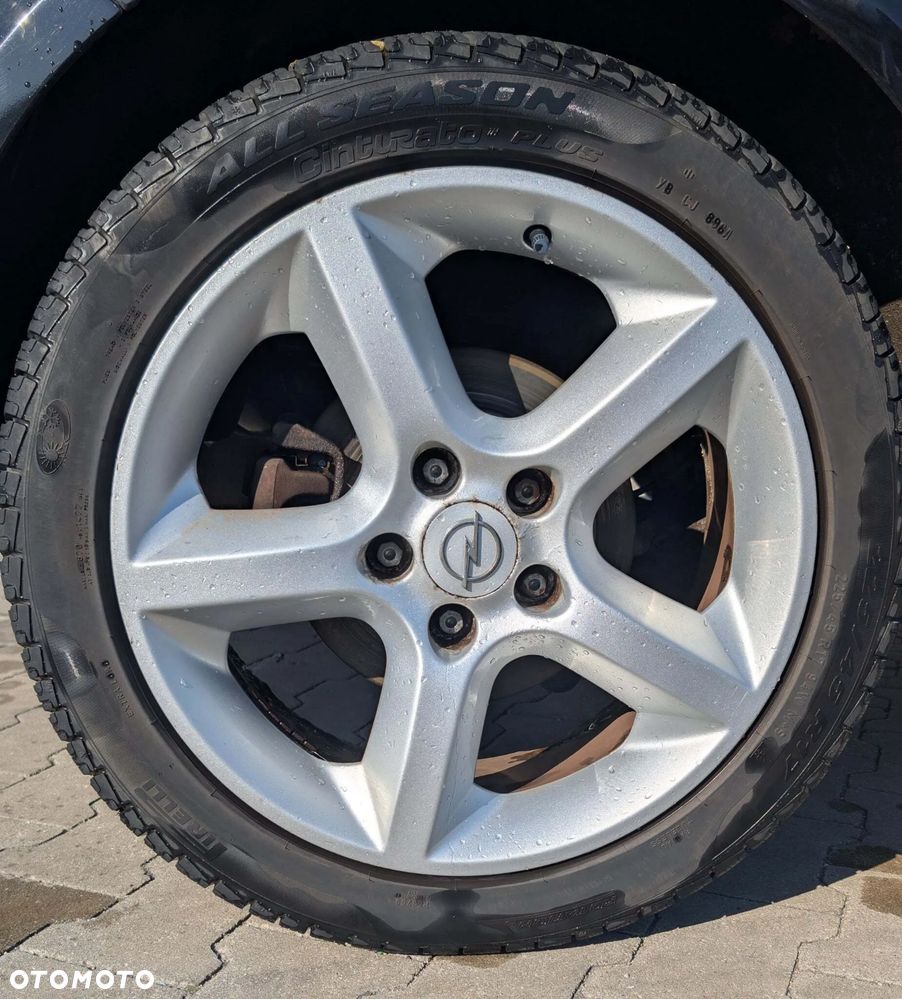Opel Astra 1.8 Sport - 11