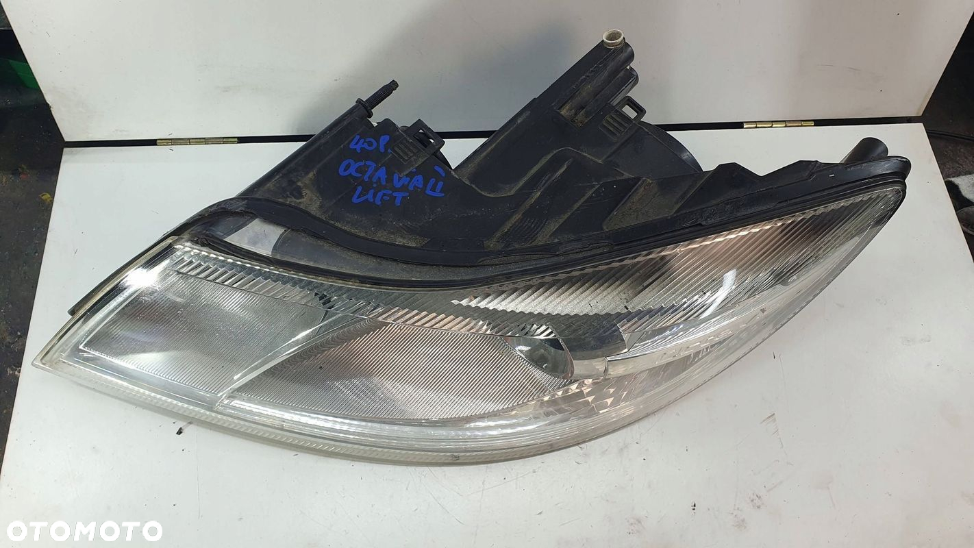 Skoda Octavia 2 II 1Z Lift 08-12 lewa lampa przednia przód reflektor € - 7