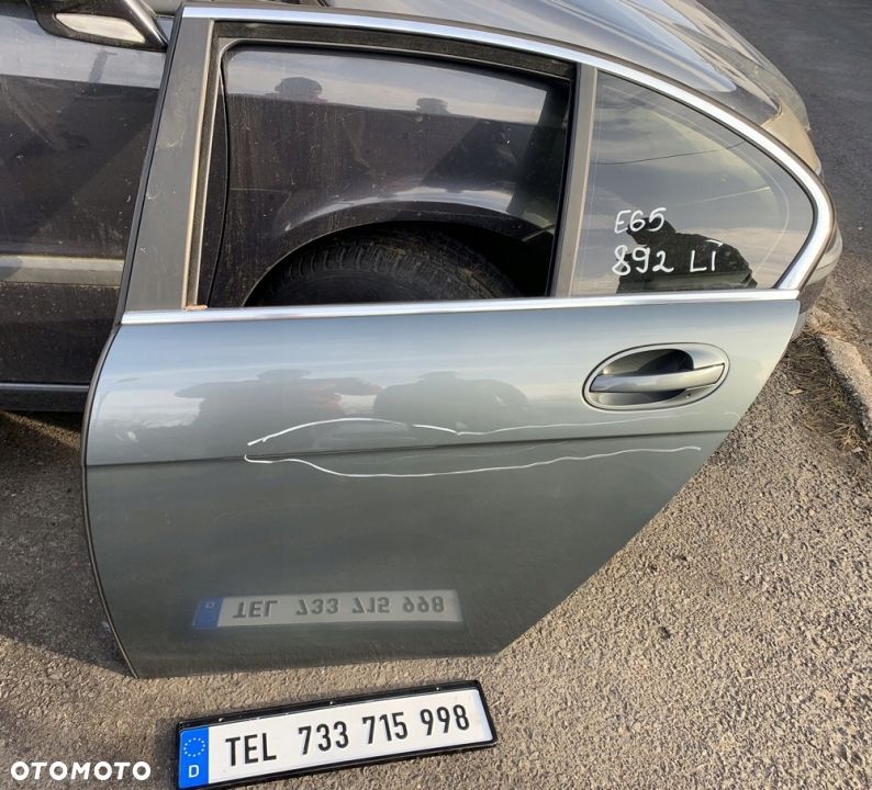 DRZWI TYLNE LEWE KOMPLETNE TITANGRAU 892 BMW E65 - 1