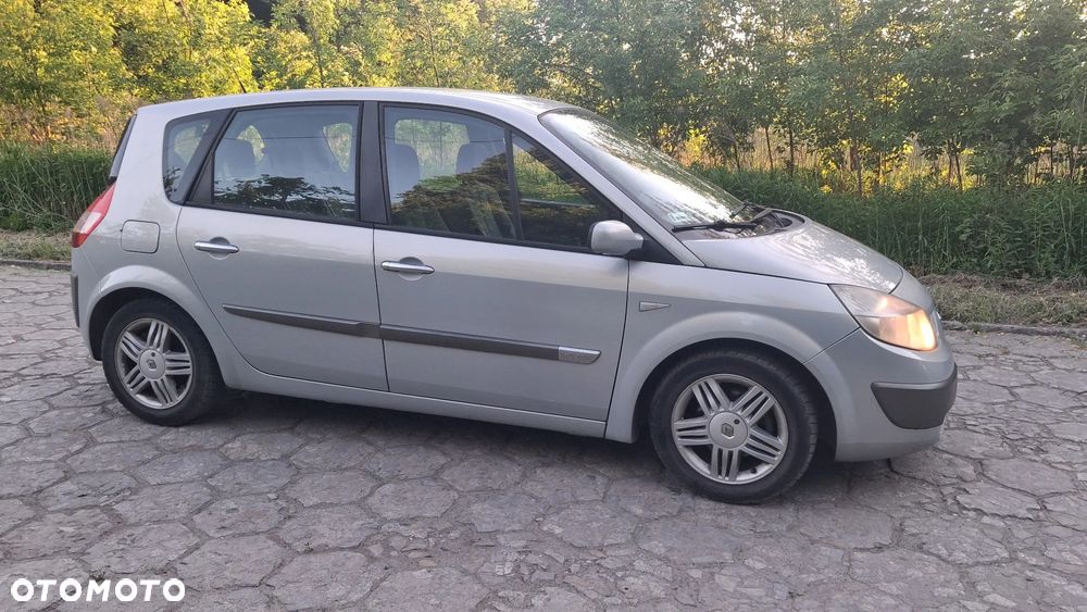 Na części Renault Scenic II silnik 1.6 16v K4M782 lakier MV632 skrzynia maska zderzak drzwi klapa szyba fotel kanapa lusterko lampa deska GWARANCJA !!! Przód Tył Zestaw Komplet Drzwi Klapa Zderzak Błotnik Maska Grill Atrapa Szyba Pas Lampa Lusterko Boczki Fotel Kanapa Kokpit Deska Rozdzielcza Przełącznik Włącznik Sterownik Przewody Wiązka Instalacja Moduł Komputer Czujnik Listwa Pompa Alternator Wtryski Głowica Rozrusznik Kompresor Sprzęgło Dwumas Silnik  Skrzynia ABS Klimatyzacji Paliwa Wspomagania Kolektor Turbina Przepustnica Zawór Chłodnica Koło Hak Belka Sanki Zawieszenie Mcpherson Półoś Amortyzator Wydech Tłumik Zacisk - 9