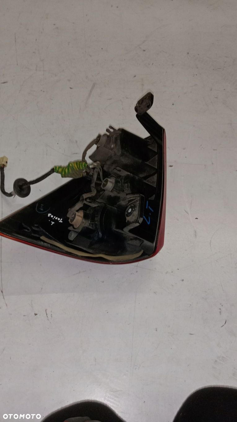 Lampa tył tylna EUROPA BDB STAN LEWA Daihatsu Terios II 06- - 9
