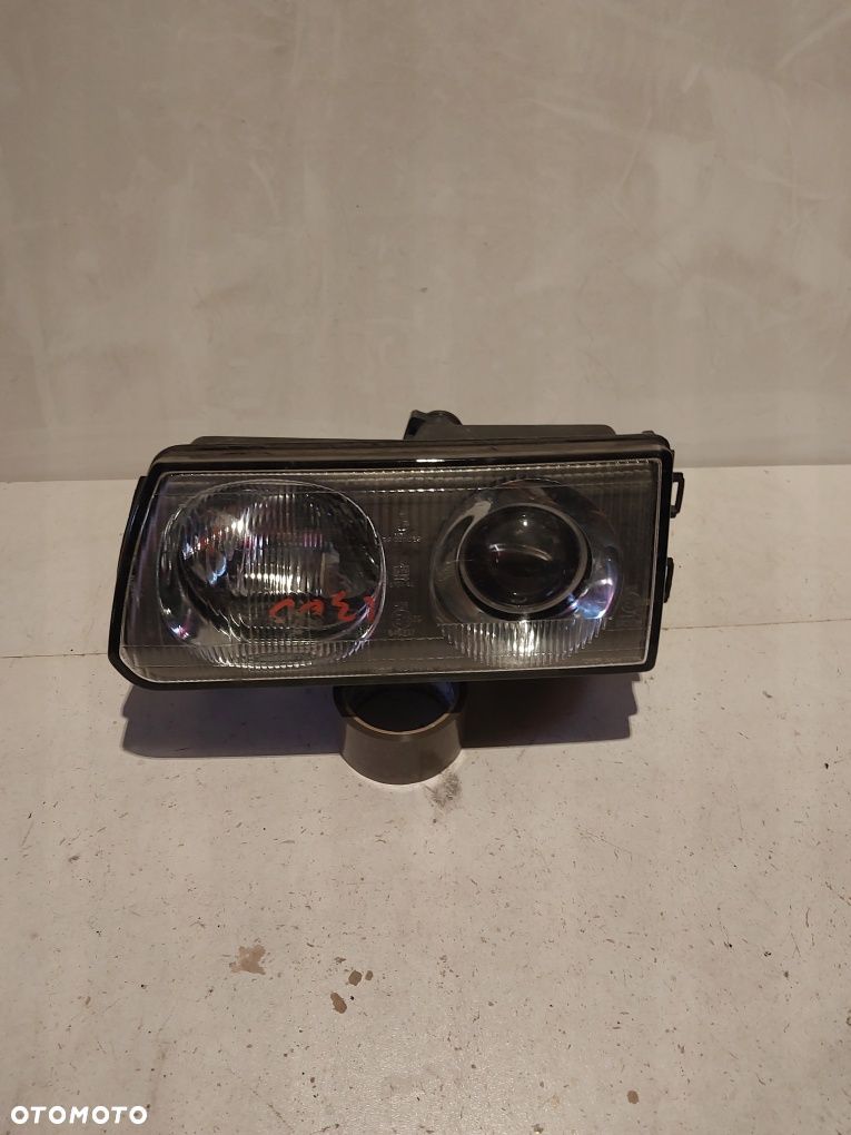 Mitsubishi L 300 L300 lewa lampa przednia reflektor lewy - 1