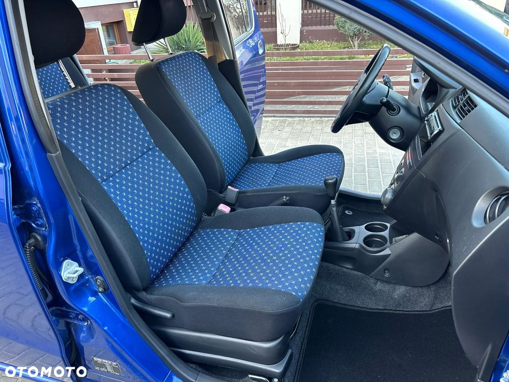 Daihatsu Cuore 1.0 Top - 23