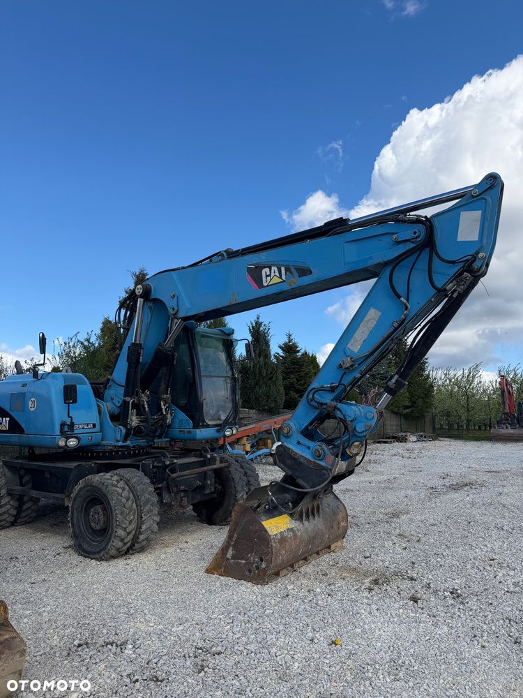 Caterpillar M322D - 8