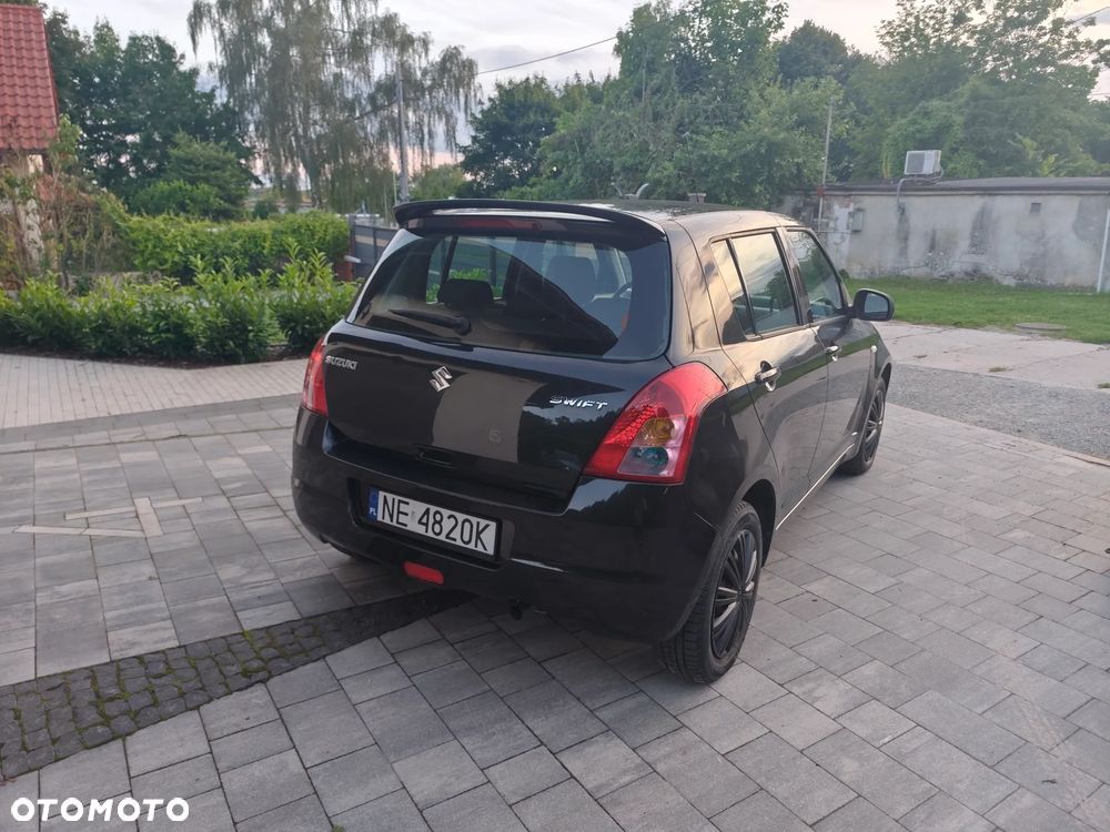Suzuki Swift 1.3 Club - 4