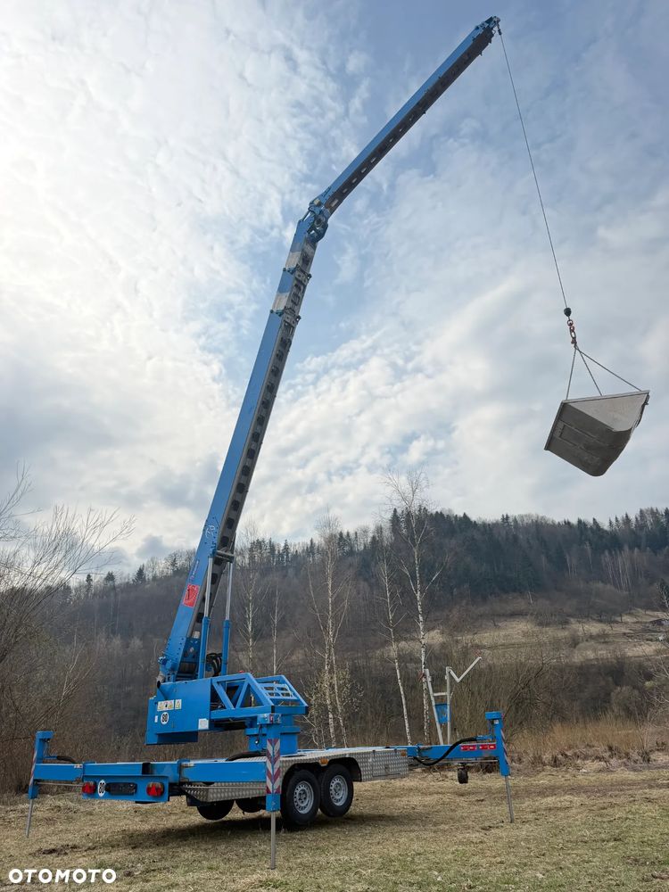KLAAS K21/31TSR Dźwig Dekarski żuraw zwyżka podnośnik 31m. udźwig 1800kg max. Silnik Yanmar 3cyl. Kosz pojemnik. Dźwig Sterowany całkowicie zdalnie z pilota. Do 3,5 tony Transportowanie samochodem osobowym! Podwieszana oś Hydr. Własny Napęd Hydr. na 2 koła w terenie. Maszyna jak Nowa 2 tyś mtg. 2015r. Po serwisach Dekra. Sprowadzona z Norwegii. Nie różni się od nowej z salonu. Pełna Hydraulika w maszynie. Najbogatsza wersja. OKAZJA  230volt. Zero zużycia! - 33
