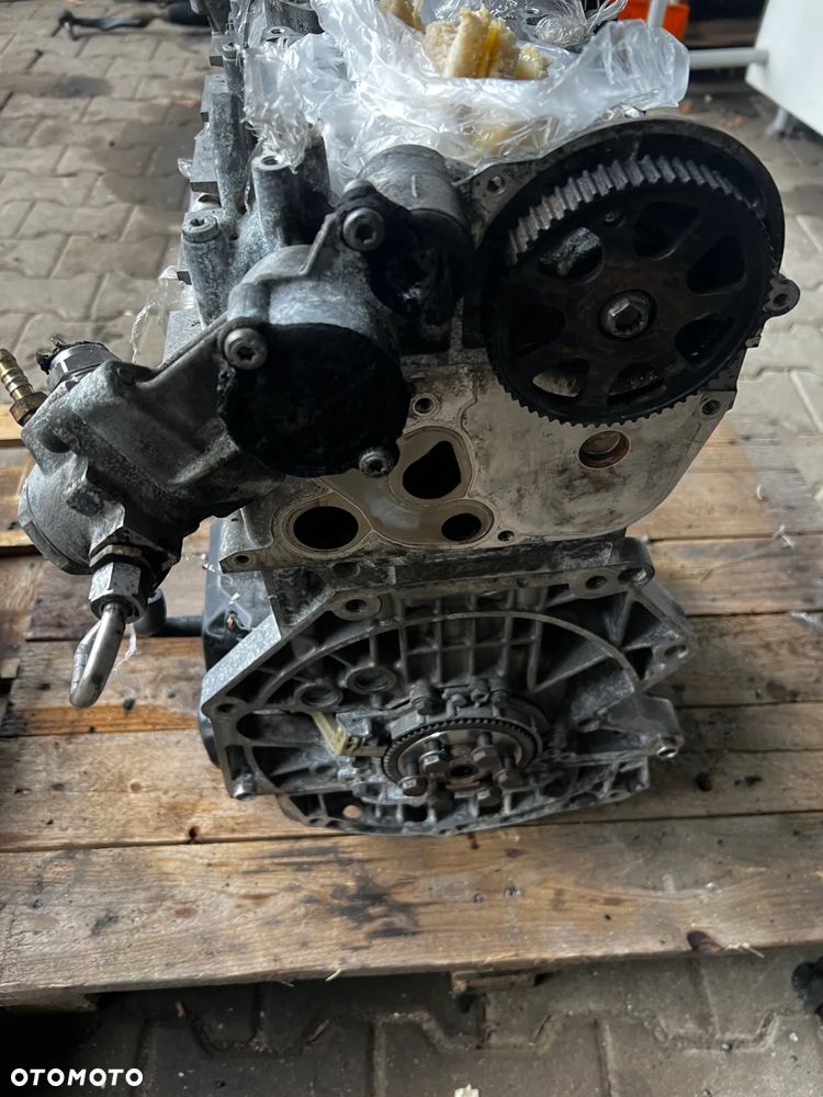 SKODA OCTAVIA III AUDI SŁUPEK 1.4 TSI  04E103023AK - 1