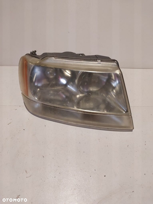 Jeep grand cherokee Wj  prawa lampa przednia przód reflektor prawy