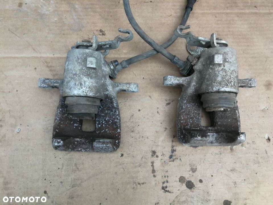 Zacisk hamulcowy tył lewy prawy Touran Octavia II Leon II - 2