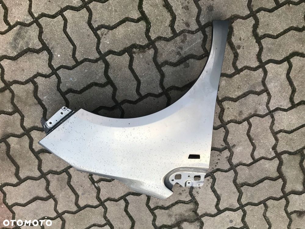 BŁOTNIK PRAWY OPEL MERIVA B - 1