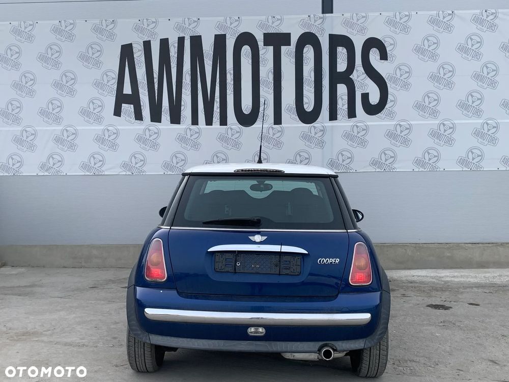 MINI COOPER 2003 *SAMOCHÓD NA CZĘŚCI* 4633 INDI BLUE (862) MASKA, LAMPA, DRZWI, LUSTERKO, ZDERZAK, GRILL, BŁOTNIK, KLAPA, BELKA, DESKA, FOTELE, KANAPA, ĆWIARTKA KIEROWNICA, TARCZE, ZACISKI, ZAWIESZENIE, KOMPLETNY PRZÓD, KOMPLETNY TYŁ, LICZNIK, ZEGARY, PRAWE LEWE PRZÓD TYŁ - 2