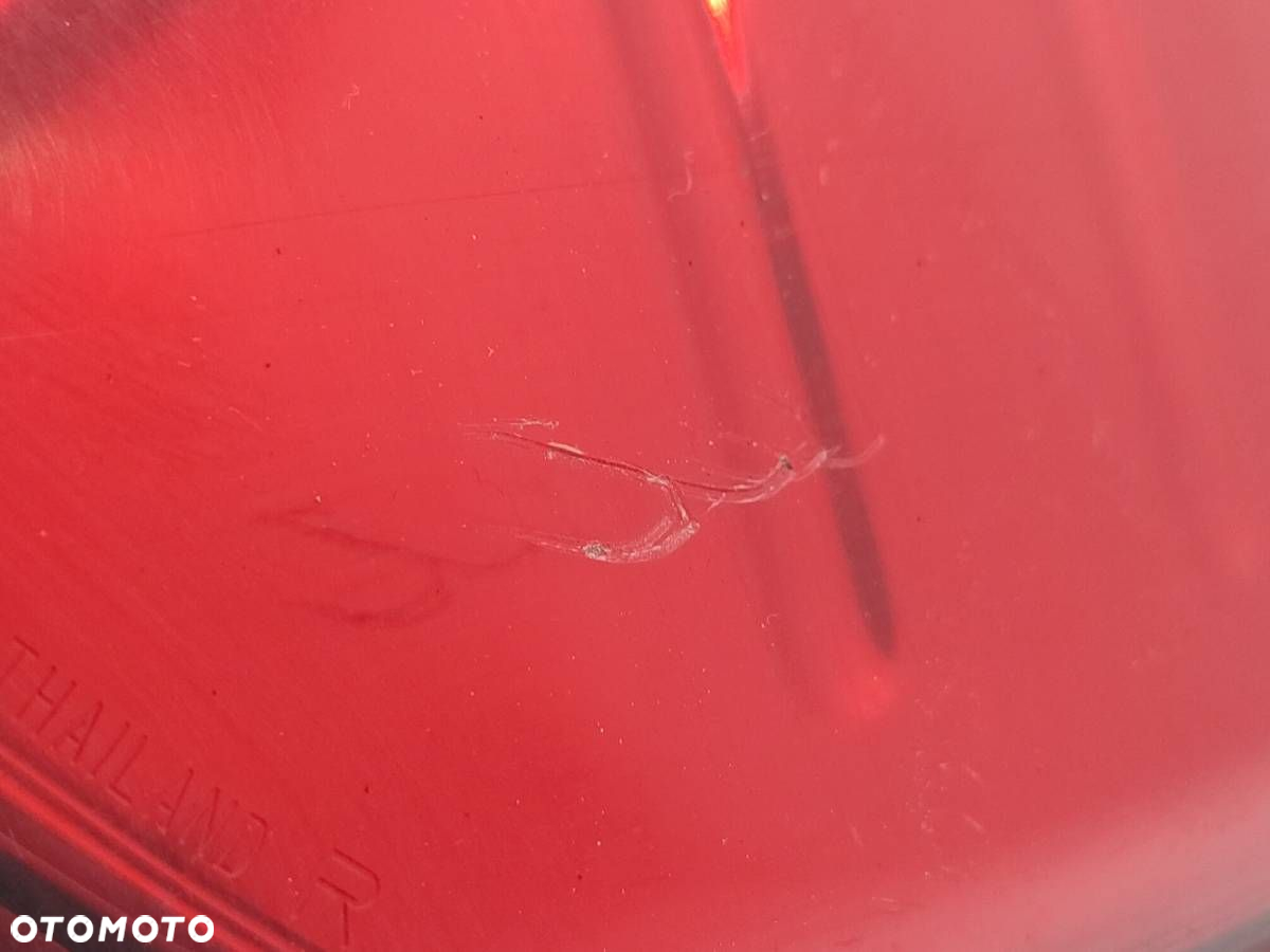 LAMPA TYL TYLNA PRAWA W BŁOTNIK NISSAN NAVARA III D40 EUROPA - 2