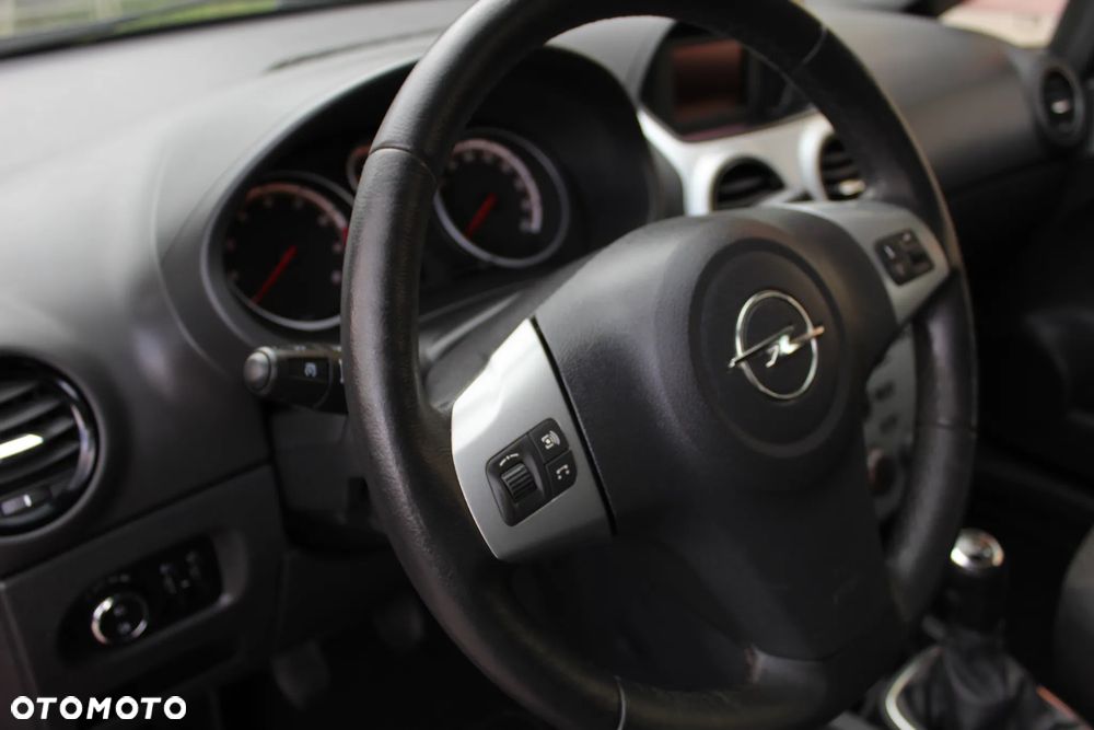 Opel Corsa 1.4 16V Active - 12