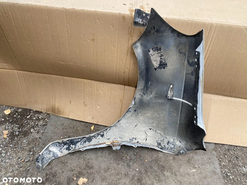 Błotnik Toyota Yaris I prawy OE - 4