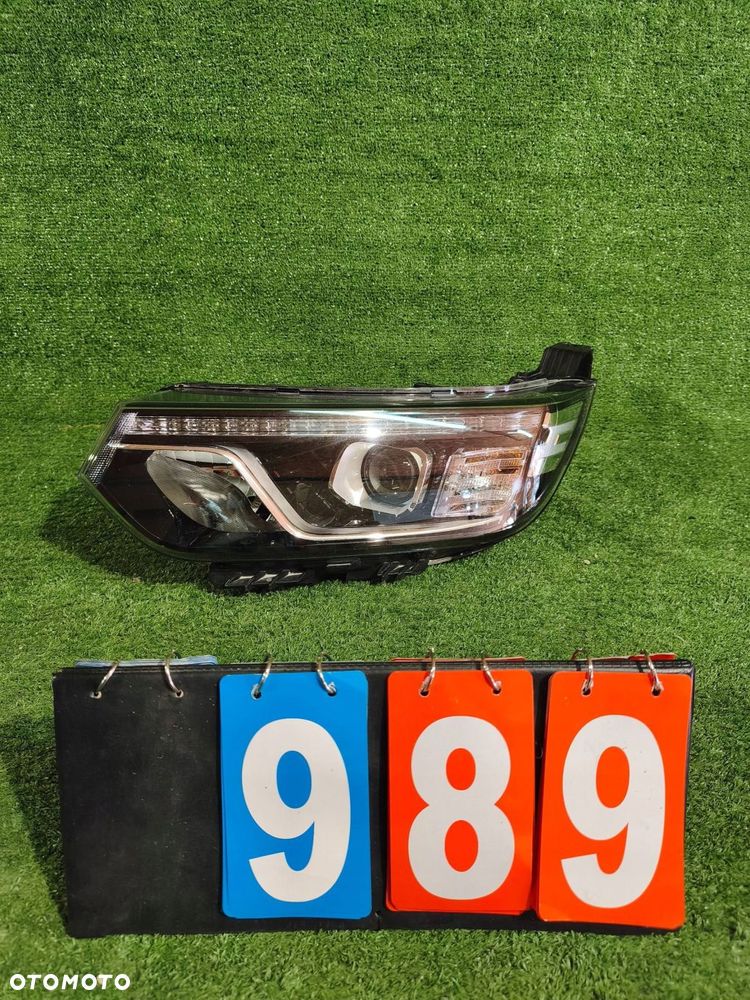 REFLEKTOR LEWY PRZÓD SSANGYONG TIVOLI LIFT 19- SOCZEWKA NR.989 - 1