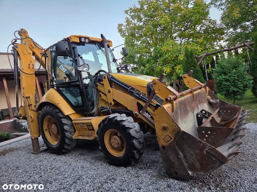 Caterpillar CAT 428E - 5