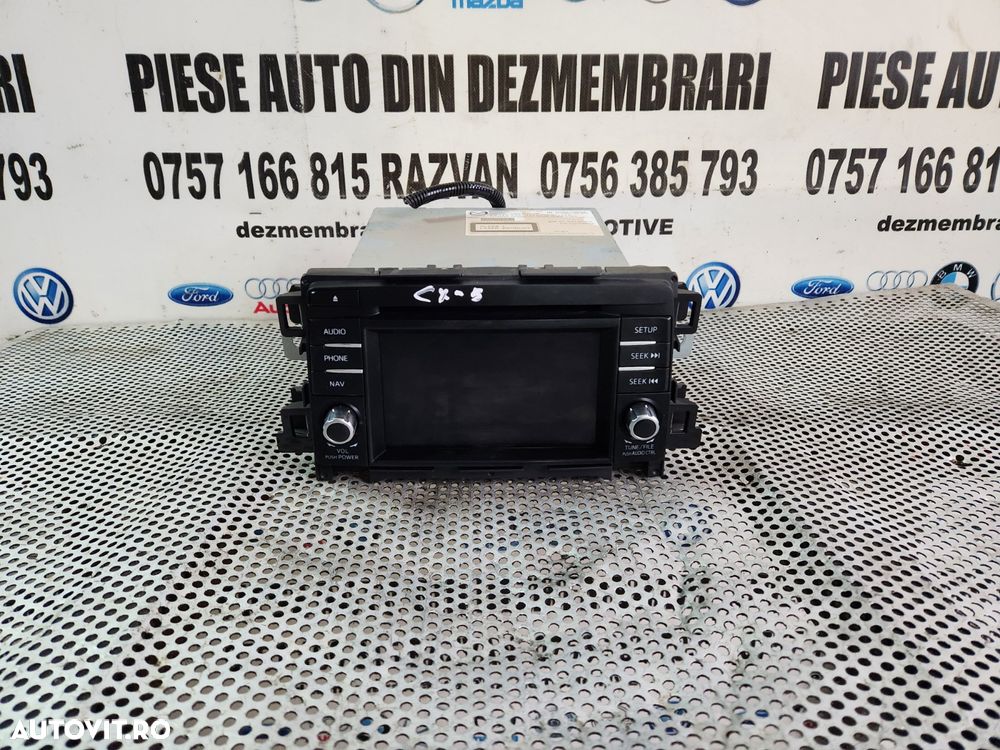 Unitate Radio Cd Navigatie Originala Mazda CX5 CX-5 An 2013-2014-2015-2016-2017 Testata Cu Garantie Dezmembrez Mazda CX5 2.2 Diesel Skyactive 4x4 An 2013-2014-2015-2016-2017 - Dezmembrari Arad - 1