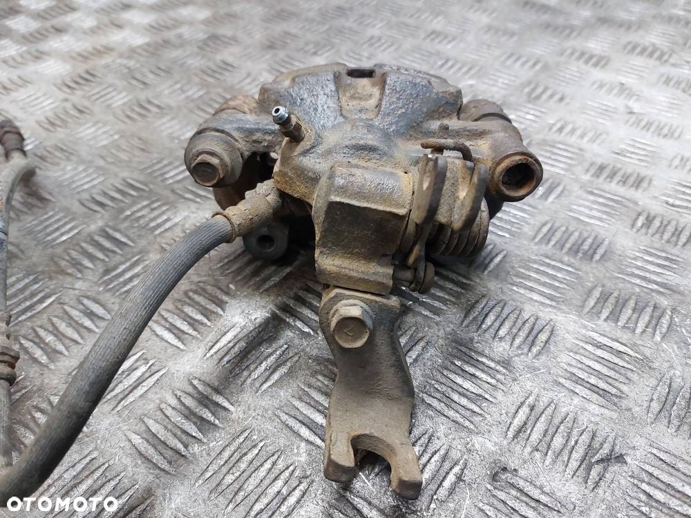 ZACISK HAMULCOWY PRAWY TYŁ MAZDA PREMACY I - 3