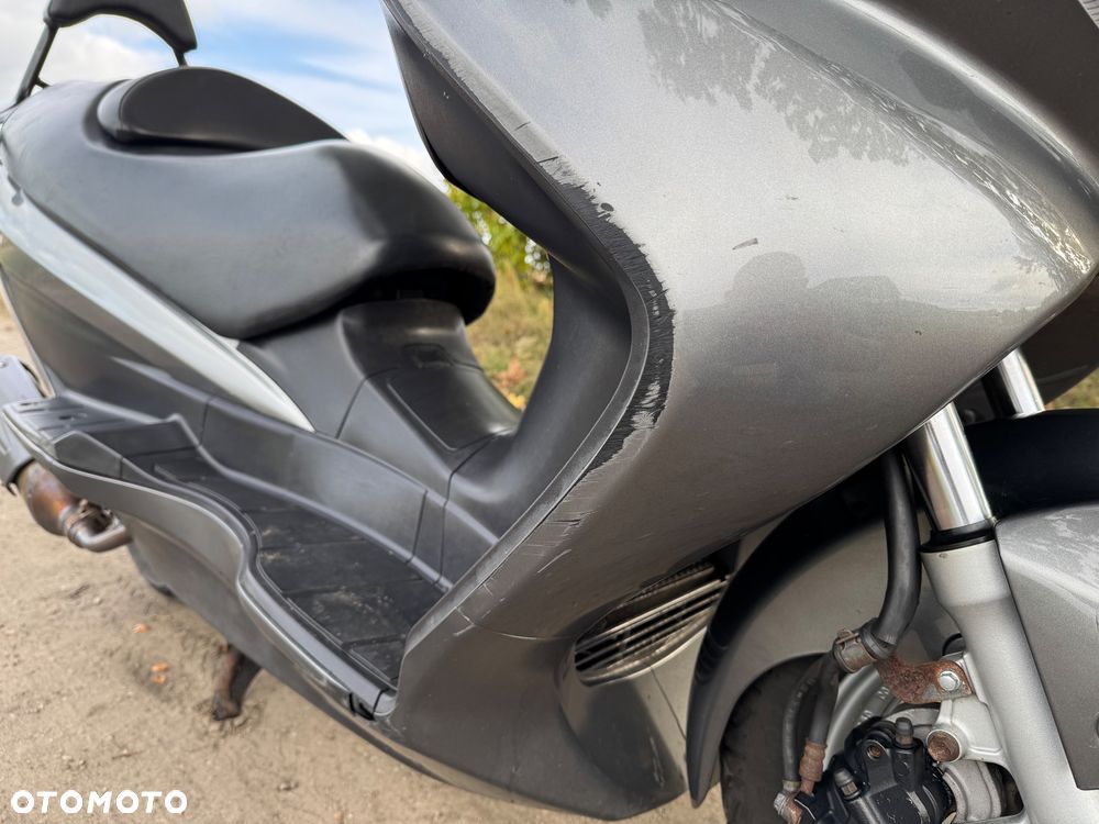 Suzuki Burgman - 16