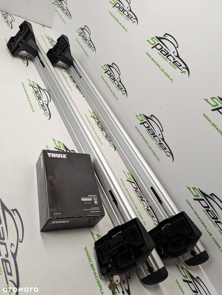 Bagażnik dachowy Thule: belki 711200 + Stopy 7105 + kit - 7