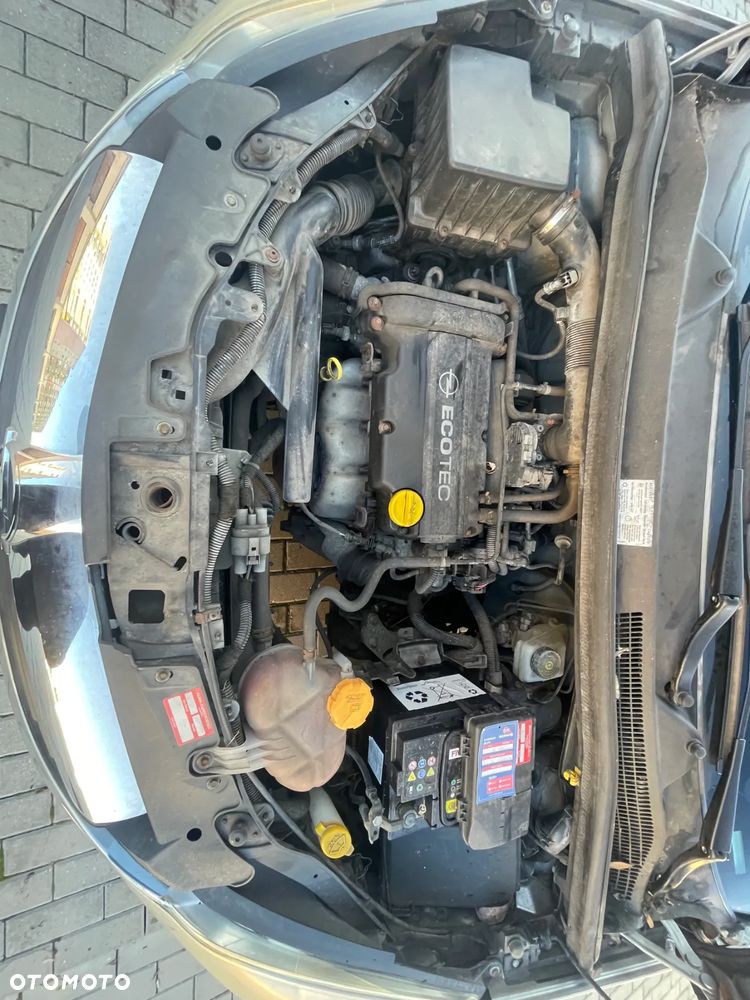 Opel Corsa 1.2 16V Enjoy - 10