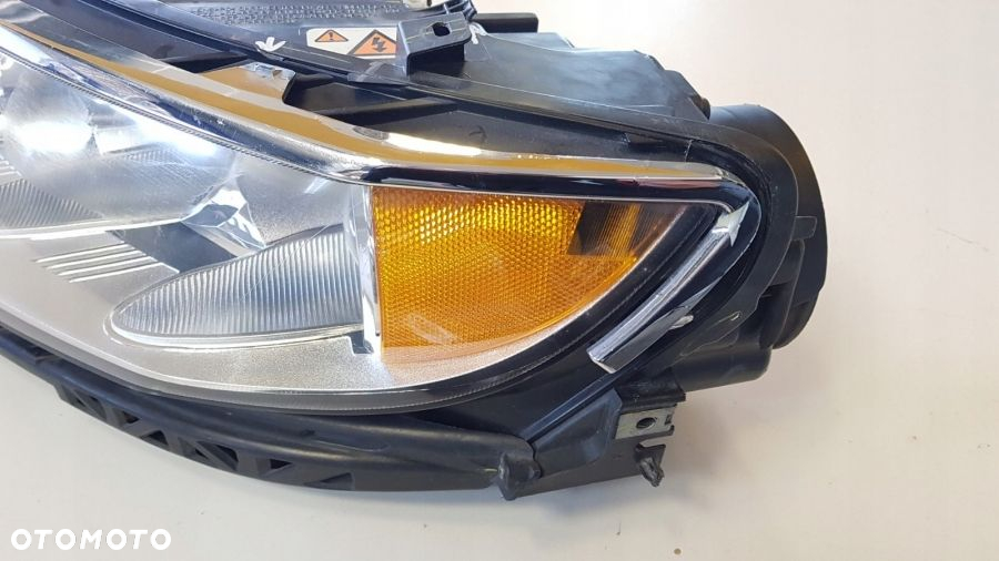 LINCOLN MKZ 2010- REFLEKTOR LAMPA XENON LEWA USA - 5