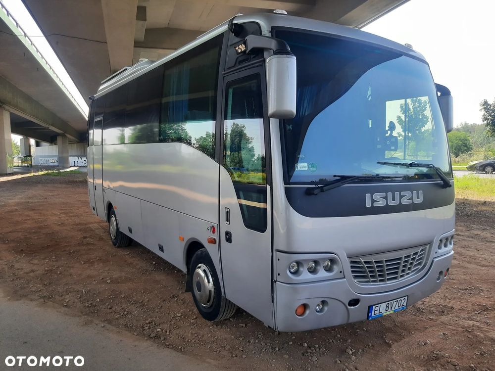 Isuzu kamper turquoise - 1