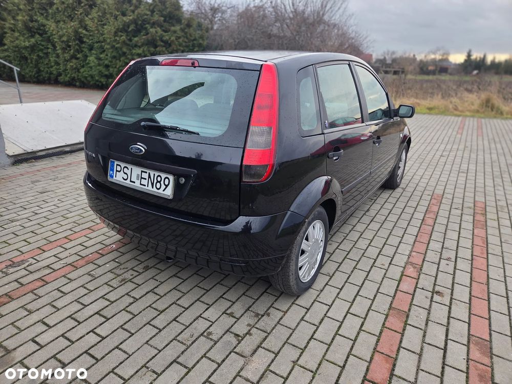 Ford Fiesta 1.4 Ghia - 5