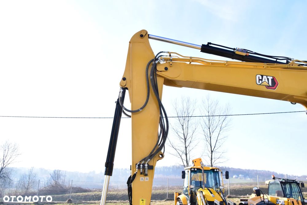 Caterpillar 310 - 7