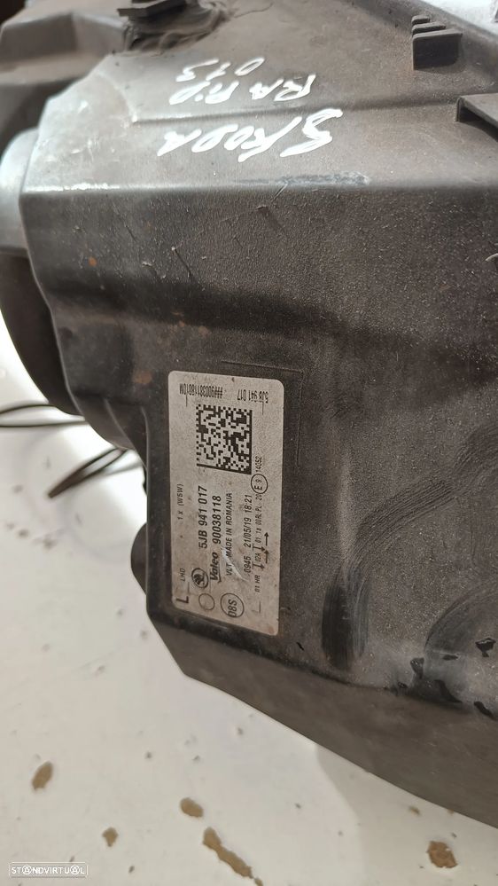 Farol óptica Skoda rapid 2013 - 5