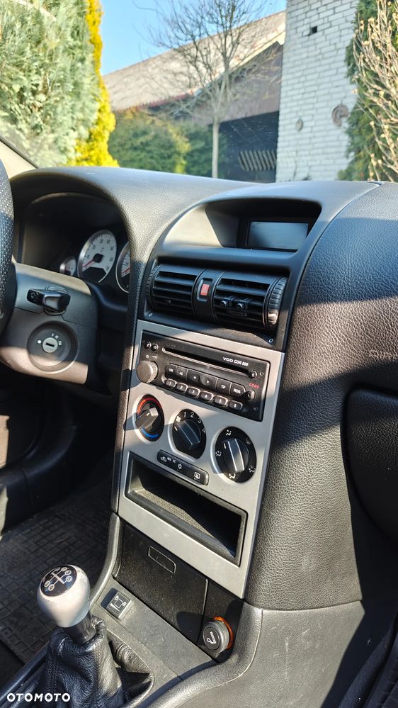 Opel Astra 1.8 Sport - 16