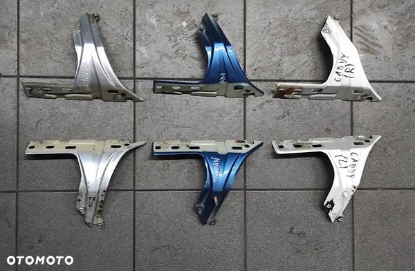 Wspornik Mocowanie Błotnika VW TOURAN CADDY PRAWY LEWY 1T0821136 1T0821135