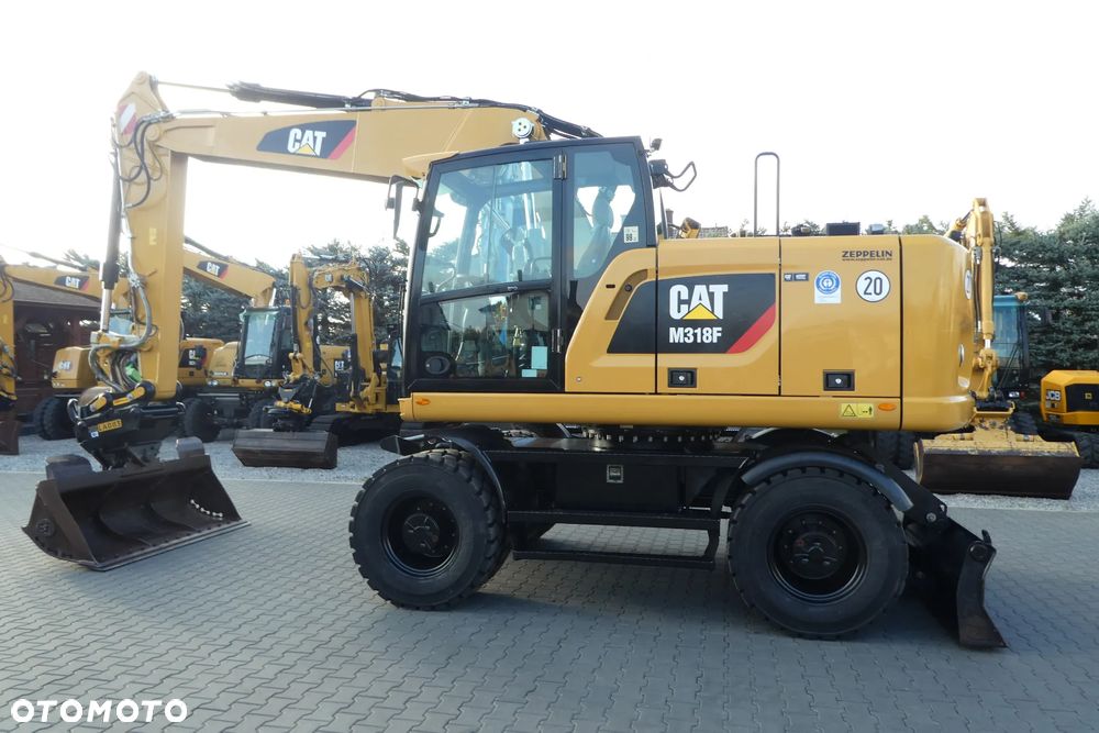 Caterpillar M315C Z NIEMIEC TRZY ŁYZKI - 30