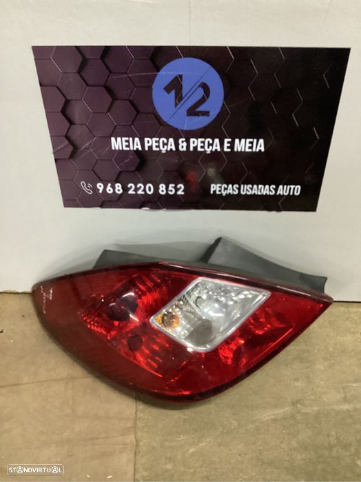 Farolim traseiro esquerdo Opel Corsa D do ano 2007 - 1