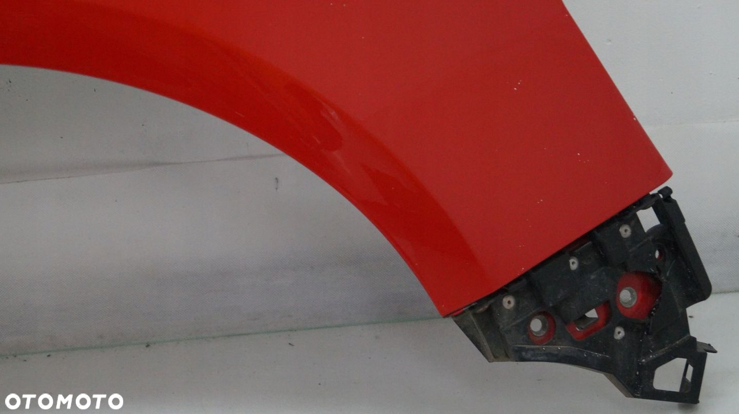 BŁOTNIK PRZEDNI PRAWY OPEL ASTRA J Z50B 2012 - 2