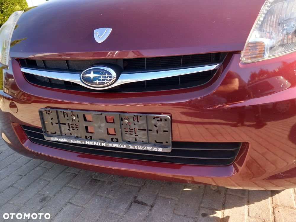 SUBARU JUSTY ZDERZAK PRZEDNI PRZÓD KOLOR: R56 - 4