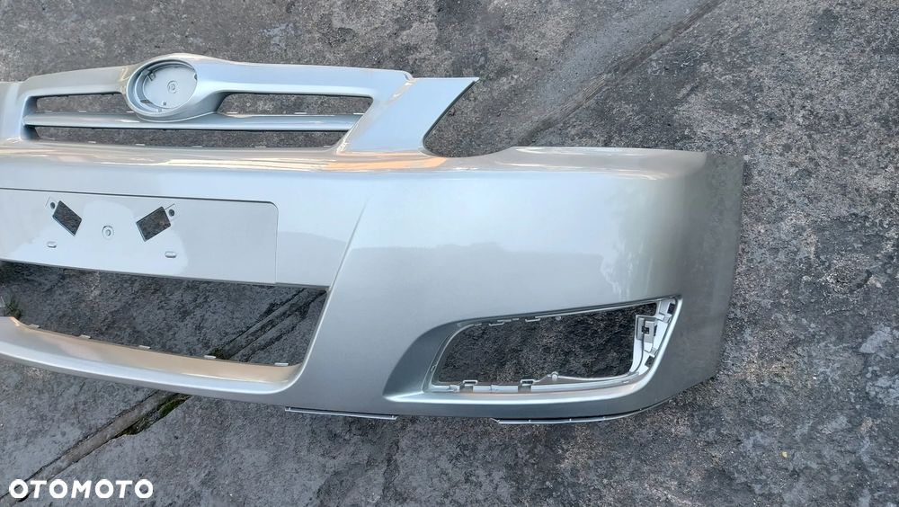 Toyota Corolla E12 04-07 LIFT zderzak przedni hatchback  kod lakieru 1C0 - 3