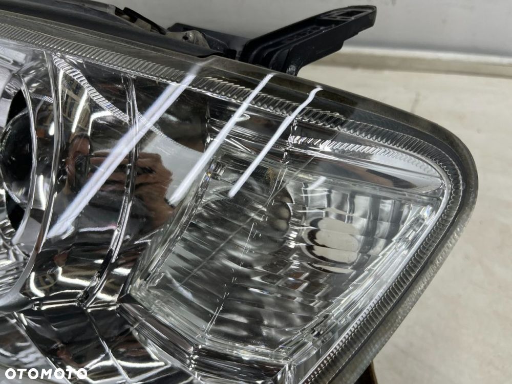 Lampa reflektor Mitsubishi L200 LIFT 10-15r. Pajero Sport II 03-16r. LEWA przednia soczewka EUROPA - 12