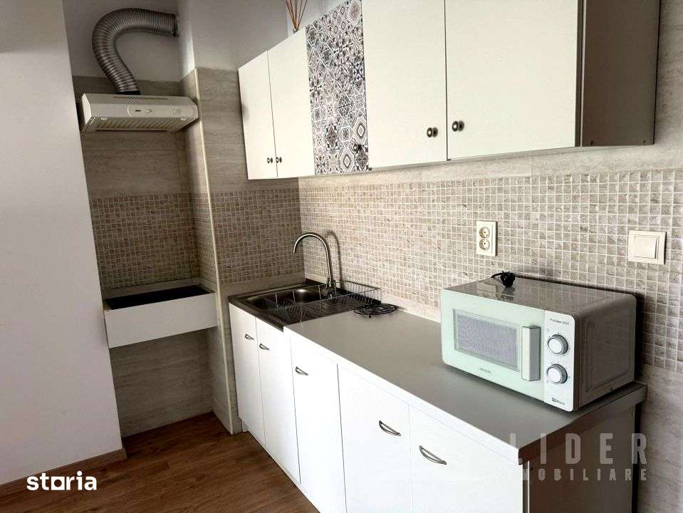 Apartament de inchiriat, living cu bucatarie, dormitor, Ansamblul Viv — fotografia 3