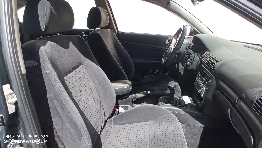 VW Passat 1.9 TDi Confortline - 13