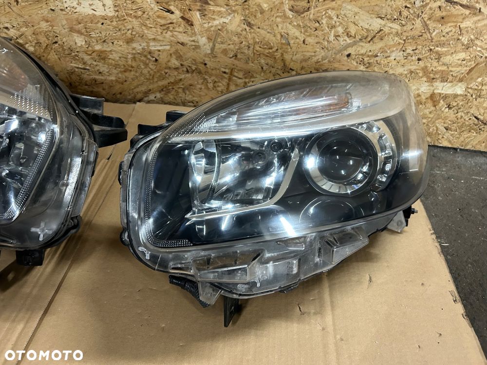 Renault Koleos I lift 2011- lampa lewy przód prawy przód europa soczewka - 2