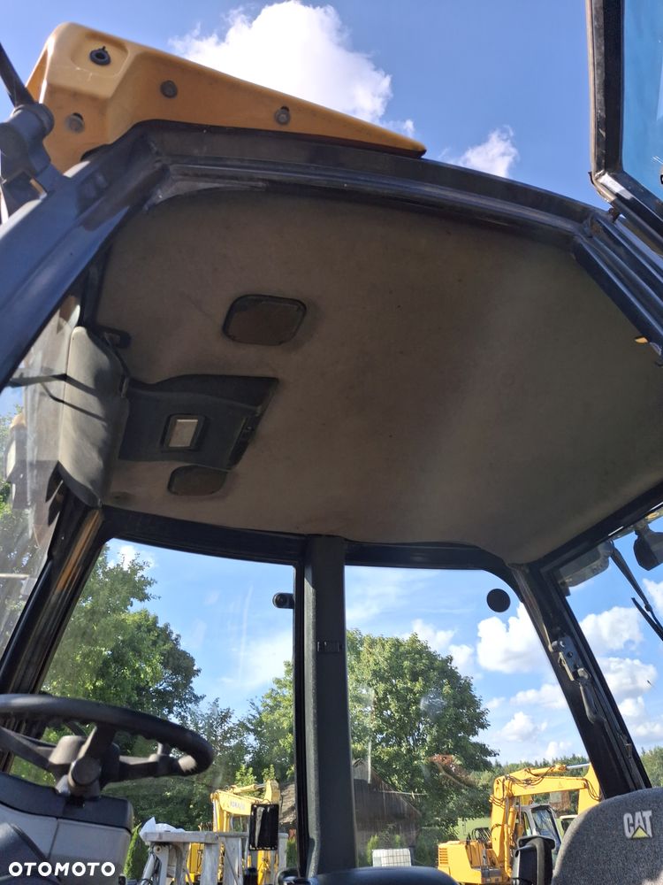 Caterpillar 428E - 7