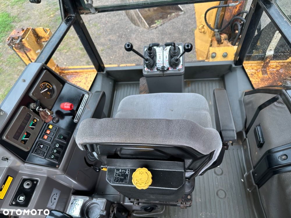 Caterpillar CAT 428D 2002 rok 4x4 moc 80KM - 8