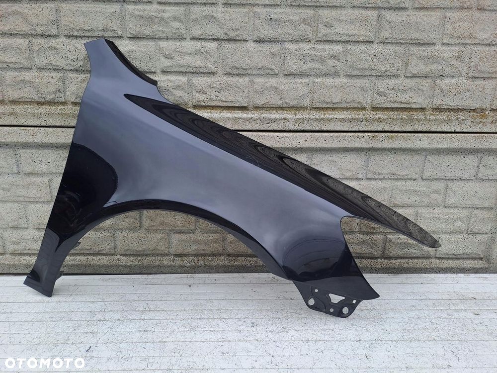 skoda octavia ii 2 lift 08-13 błotnik prawy przód oryginał - 1