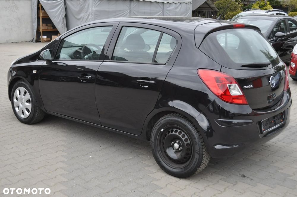 Opel Corsa 1.2 16V Cosmo - 7